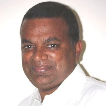 Portrait of KC Anand, founder of Healthsoft